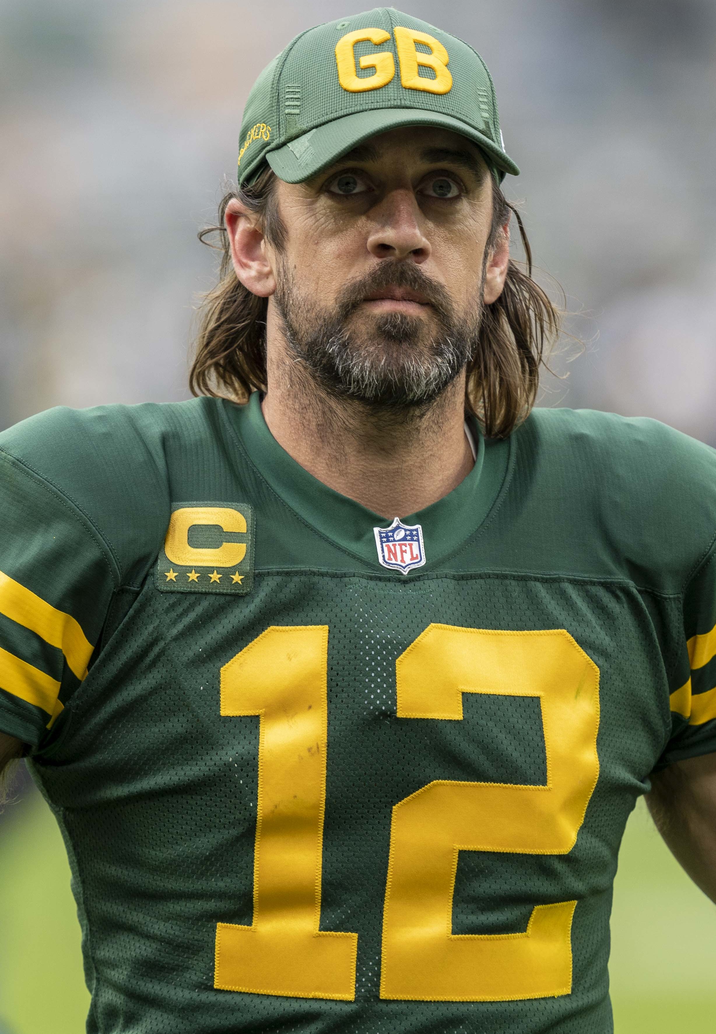 Aaron Rodgers on football field during NFL broadcast