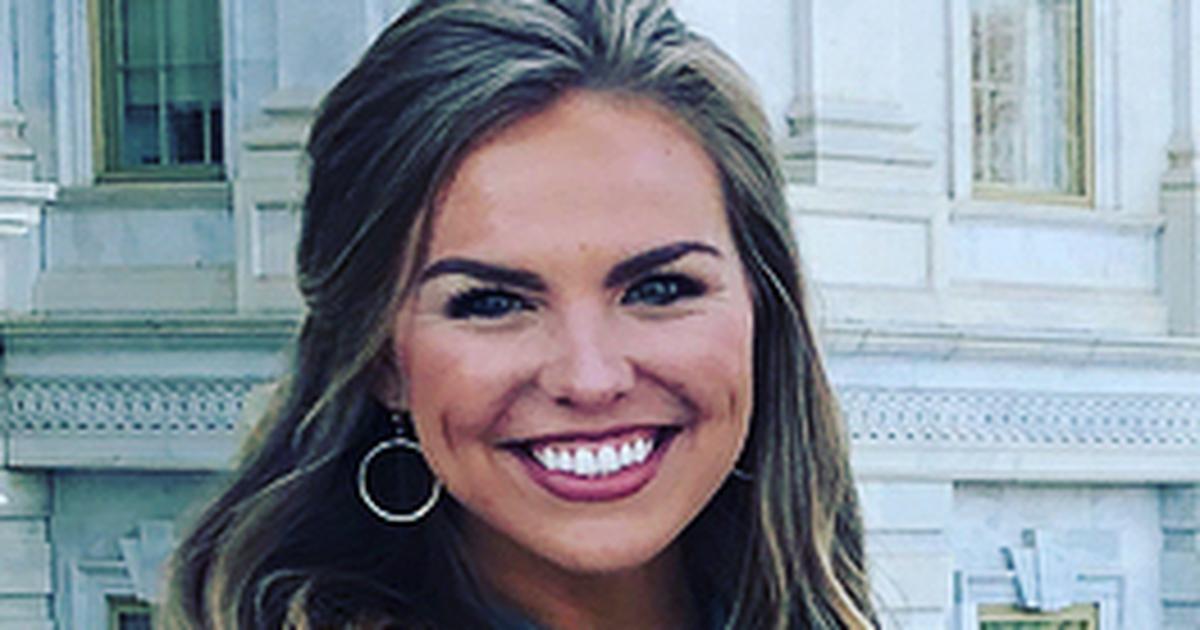 Hannah Brown smiling on red carpet