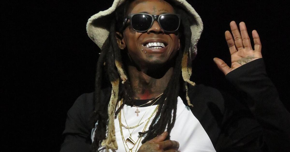 Lil Wayne performing on stage in concert