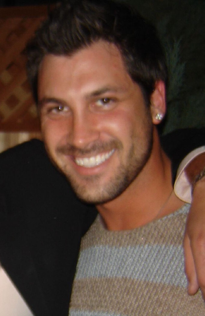 Maksim Chmerkovskiy smiling at entertainment gala
