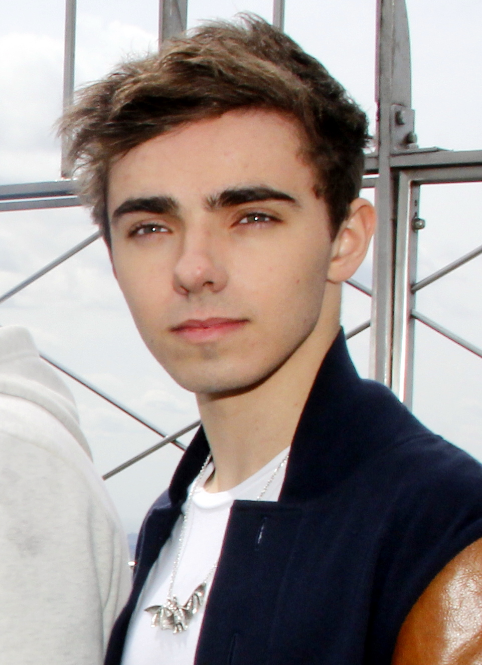 Nathan Sykes smiling at a musical event