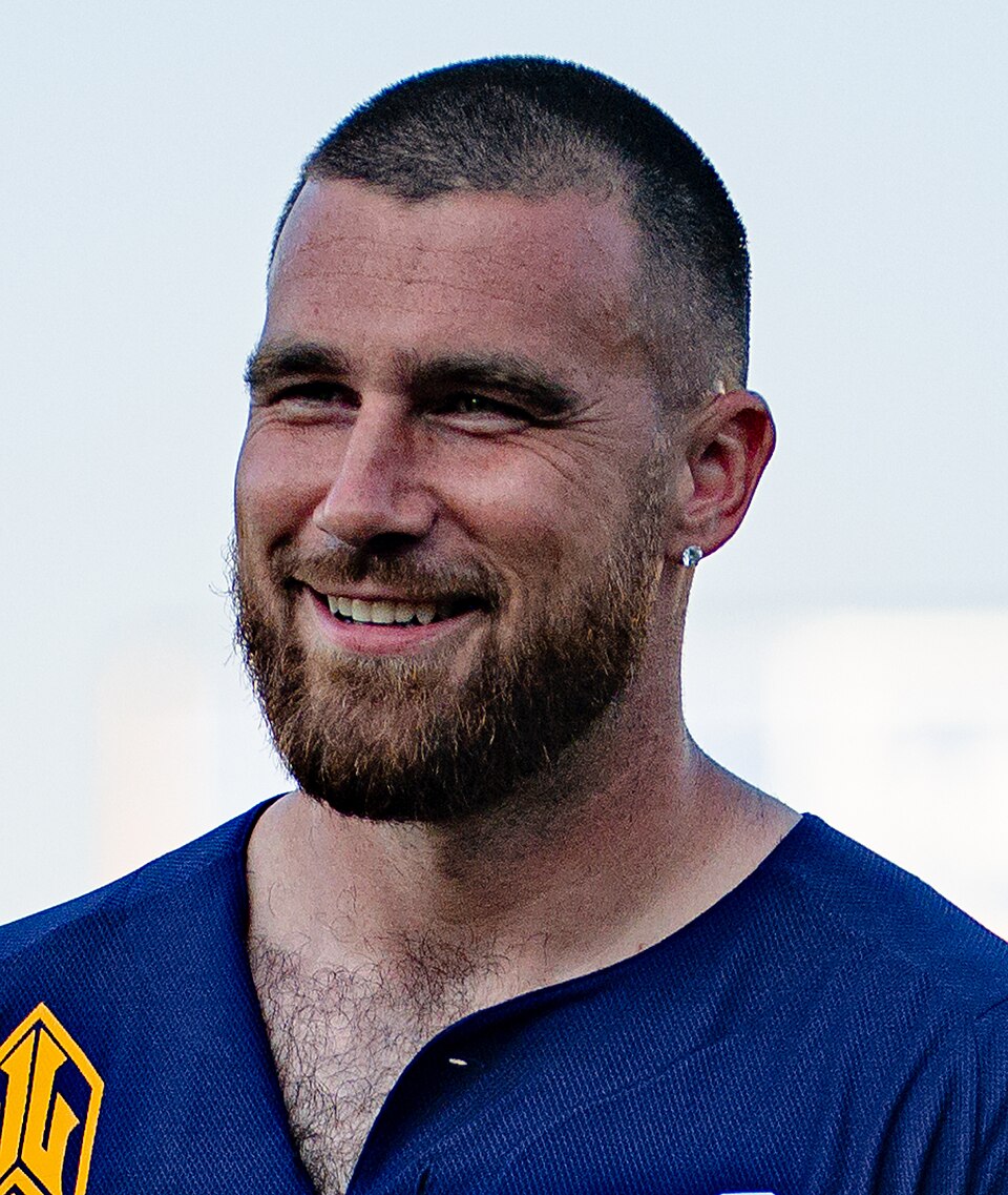 Travis Kelce speaking to reporters